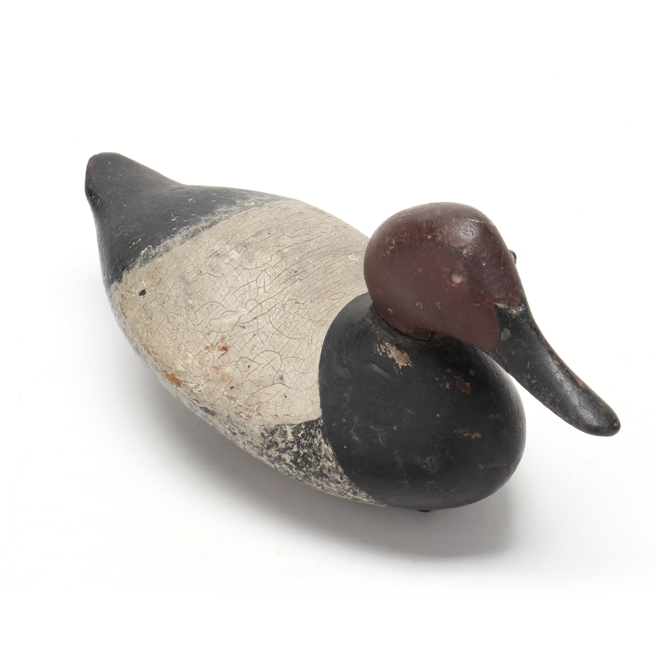Artwork by Mitchell Fulcher, Canvasback, Made of carved and painted wood, glass