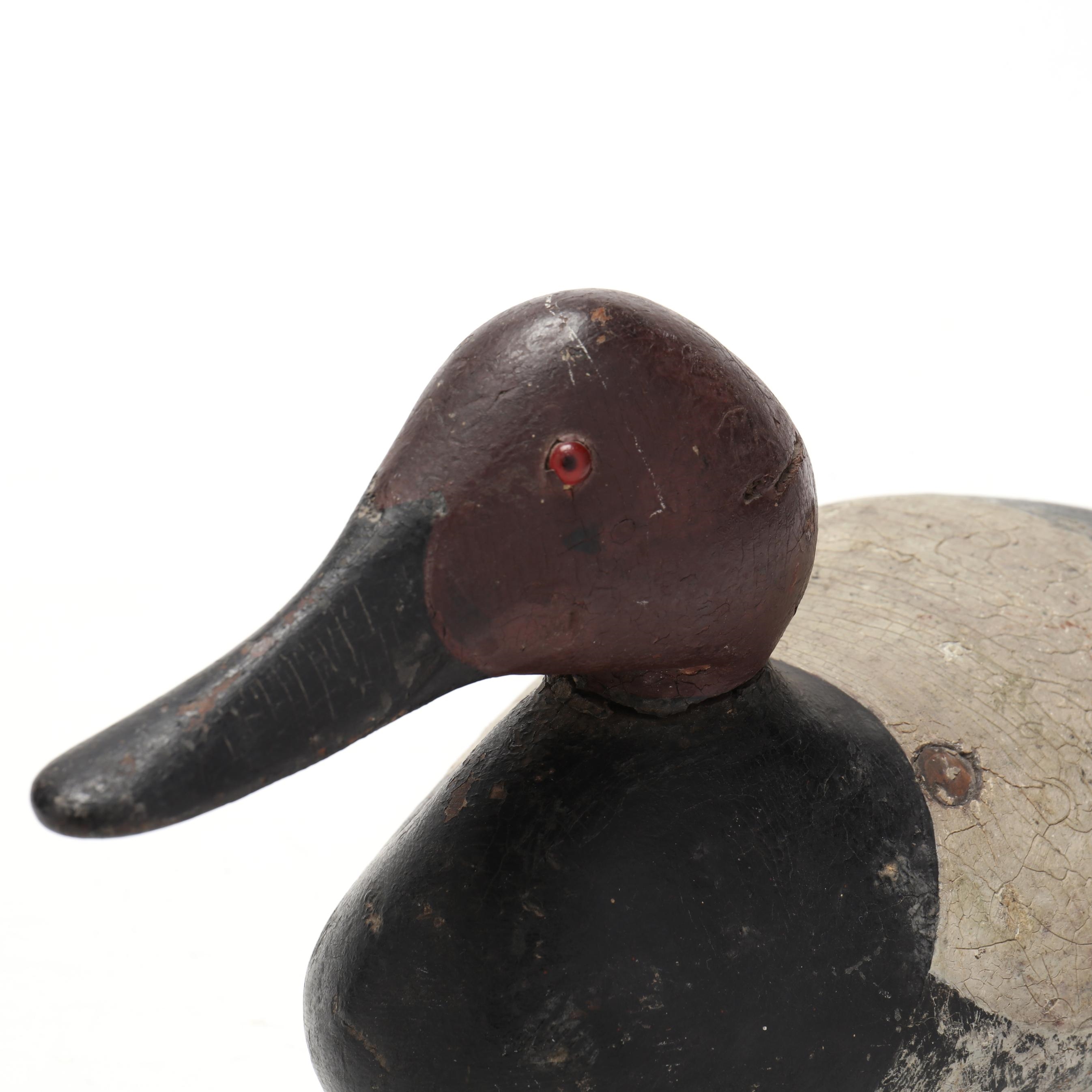 Artwork by Mitchell Fulcher, Canvasback, Made of carved and painted wood, glass