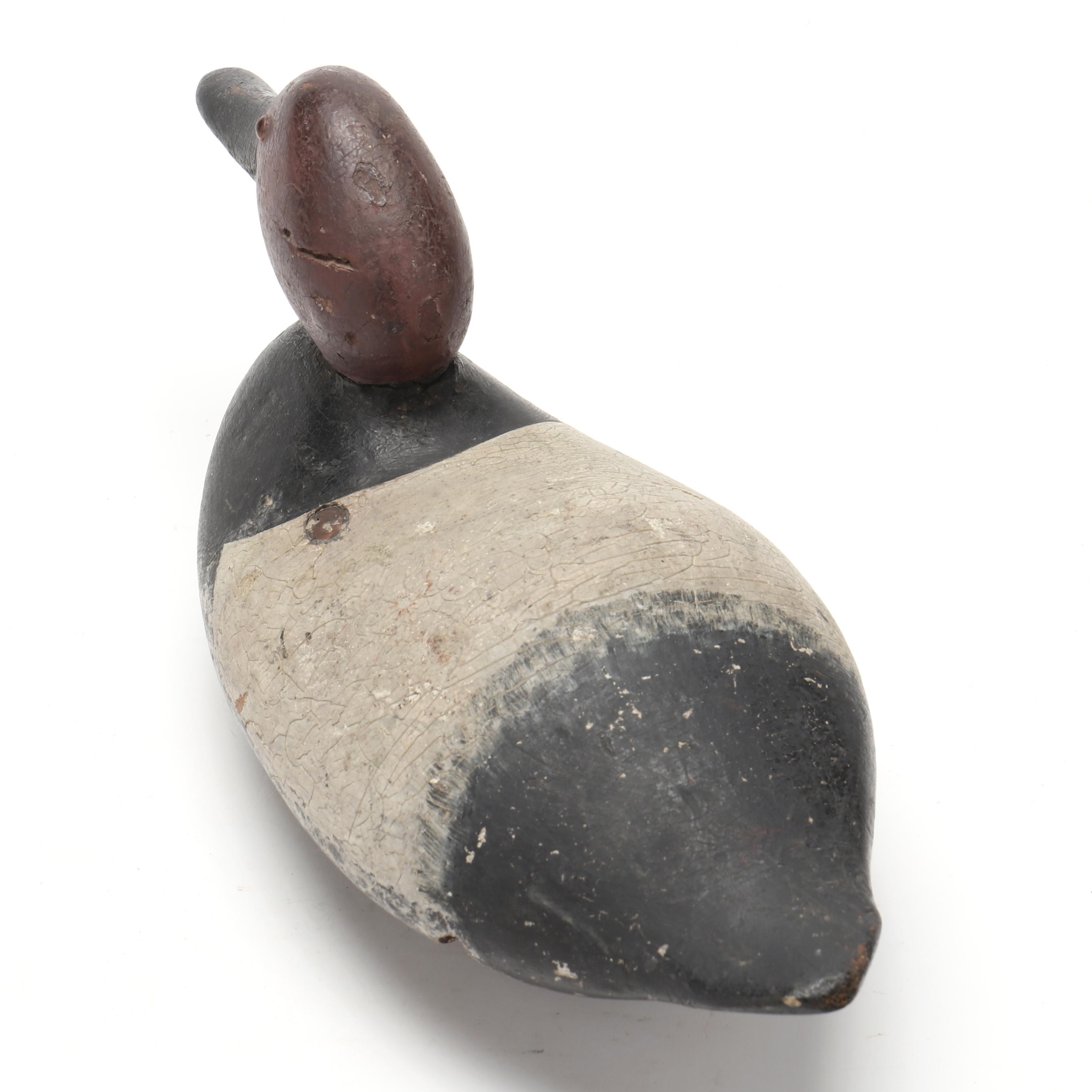 Artwork by Mitchell Fulcher, Canvasback, Made of carved and painted wood, glass