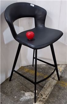 A brand new Kare design Black barstool features a sleek  seat, curved backrest - Kare Design