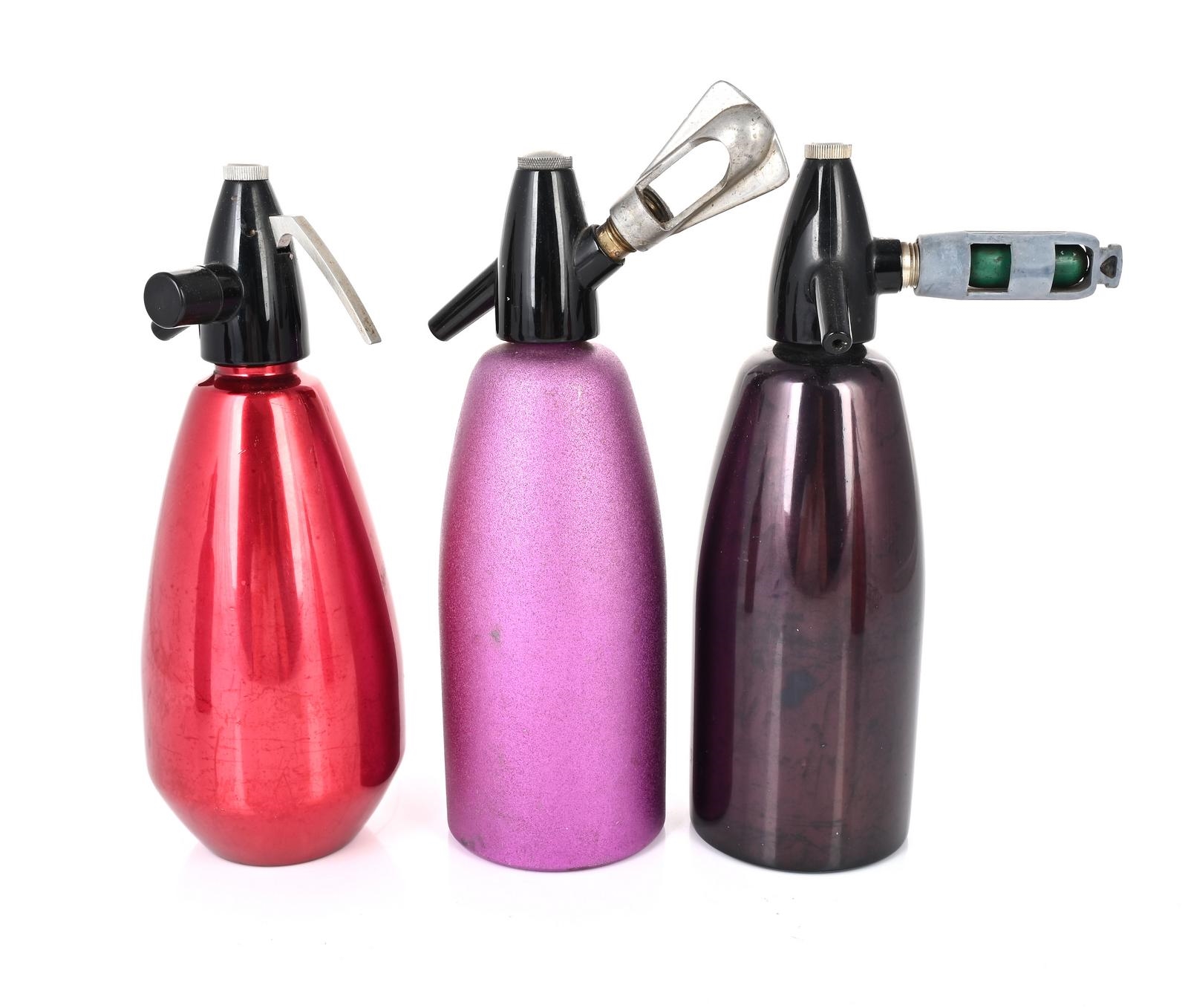 Black | Collection of five soda syphons in red, magenta, and black, one ...