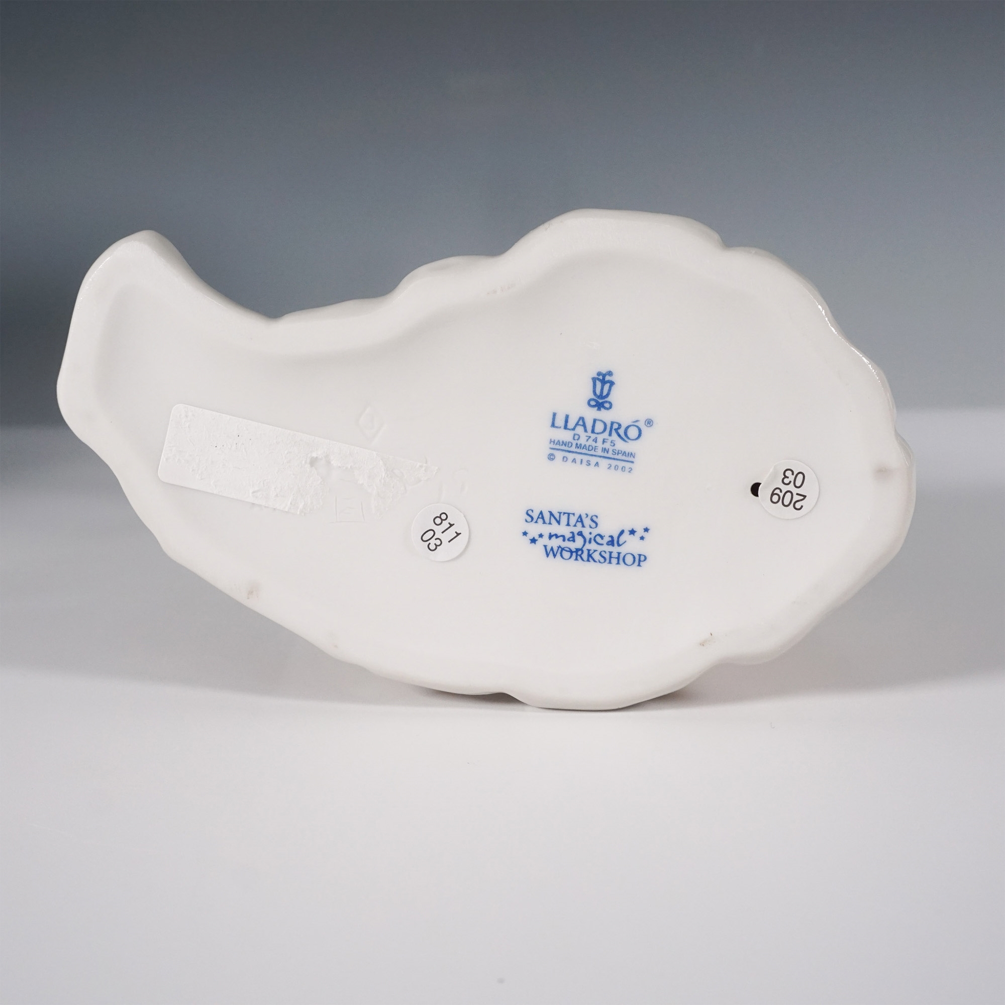 Artwork by José Santaeulalia, Lladro Porcelain Figurine, Santas Sack of Dreams 1006894, Made of porcelain figurine