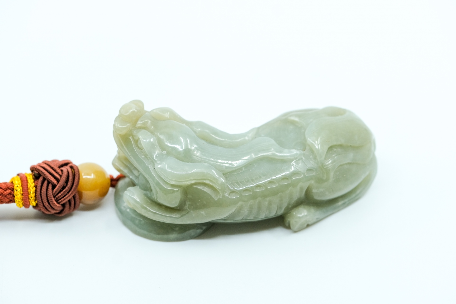 Dragon | VINTAGE JADE DRAGON PENDANT ON CORD WITH JADE BEAD | MutualArt