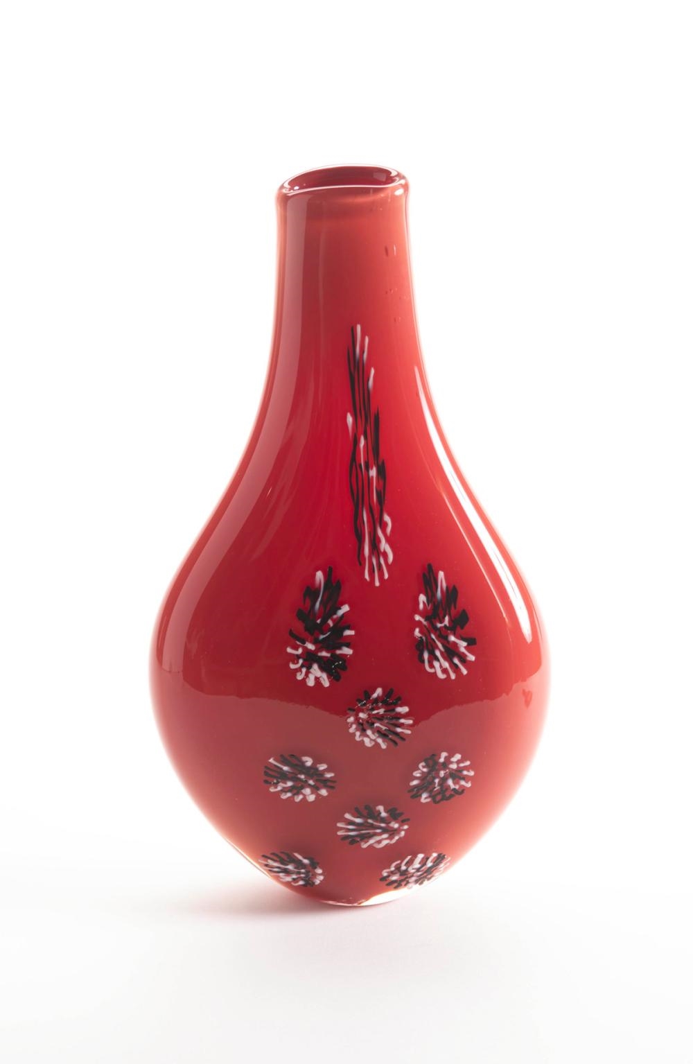 Artwork by Steve Funk, Vase, Made of iron red blown glass with black and white stylized rosettes on front of flattened body