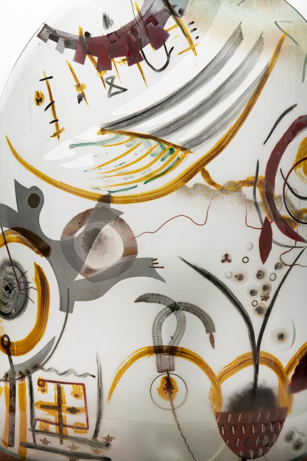 Artwork by Peter Mangan, Lamp, Made of glass with multi colored abstract inclusions designs, upon a wood base with metal fittings