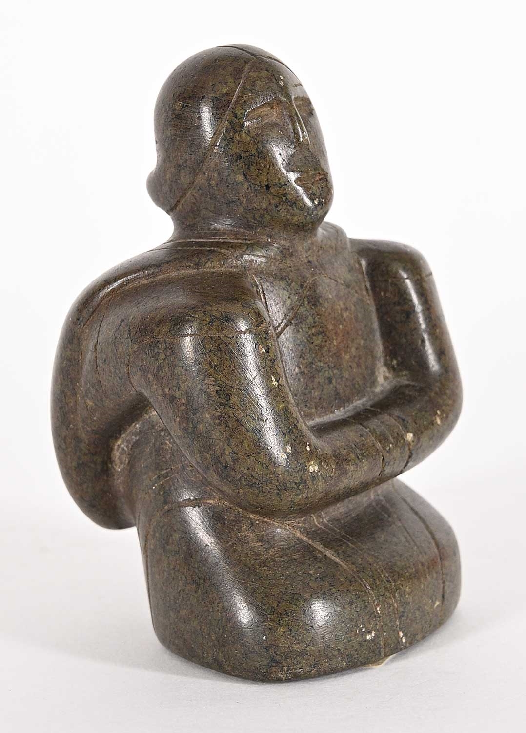 Artwork by Conlucy Nayoumealook, Untitled - Woman Crouched, Made of grey stone carving
