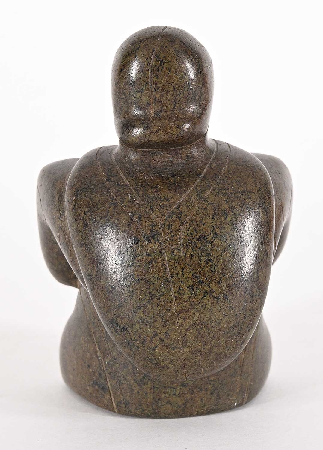 Artwork by Conlucy Nayoumealook, Untitled - Woman Crouched, Made of grey stone carving