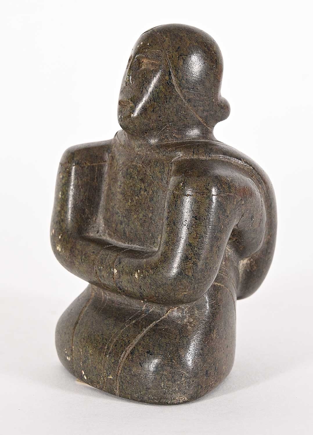 Artwork by Conlucy Nayoumealook, Untitled - Woman Crouched, Made of grey stone carving