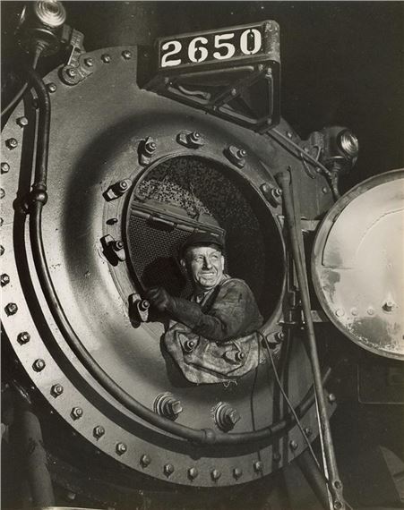 Boilermaker in Freight Egine Smoke by Gordon Parks, 1945