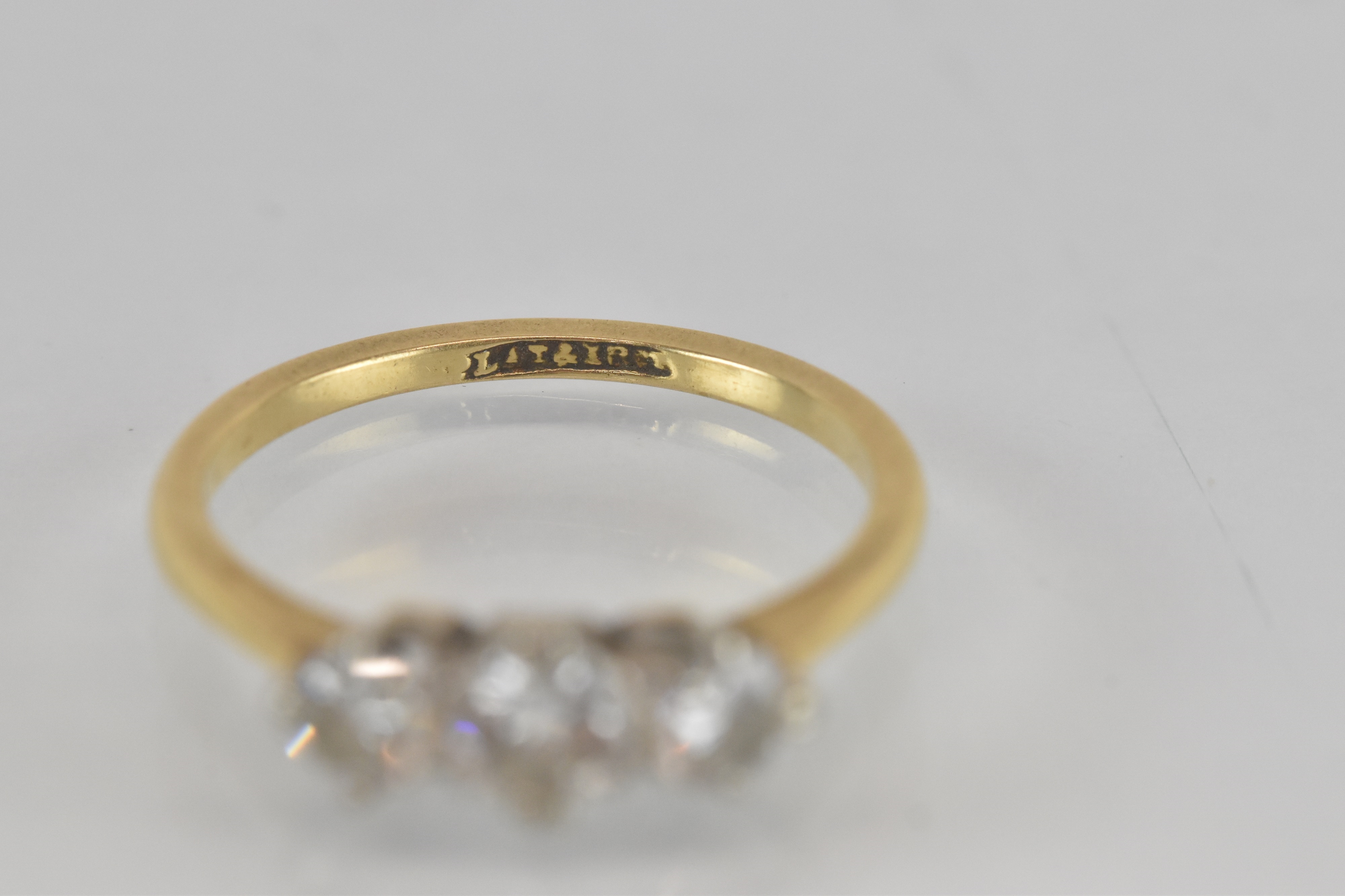 Diamond | the head set with three graduated diamonds in a platinum ...