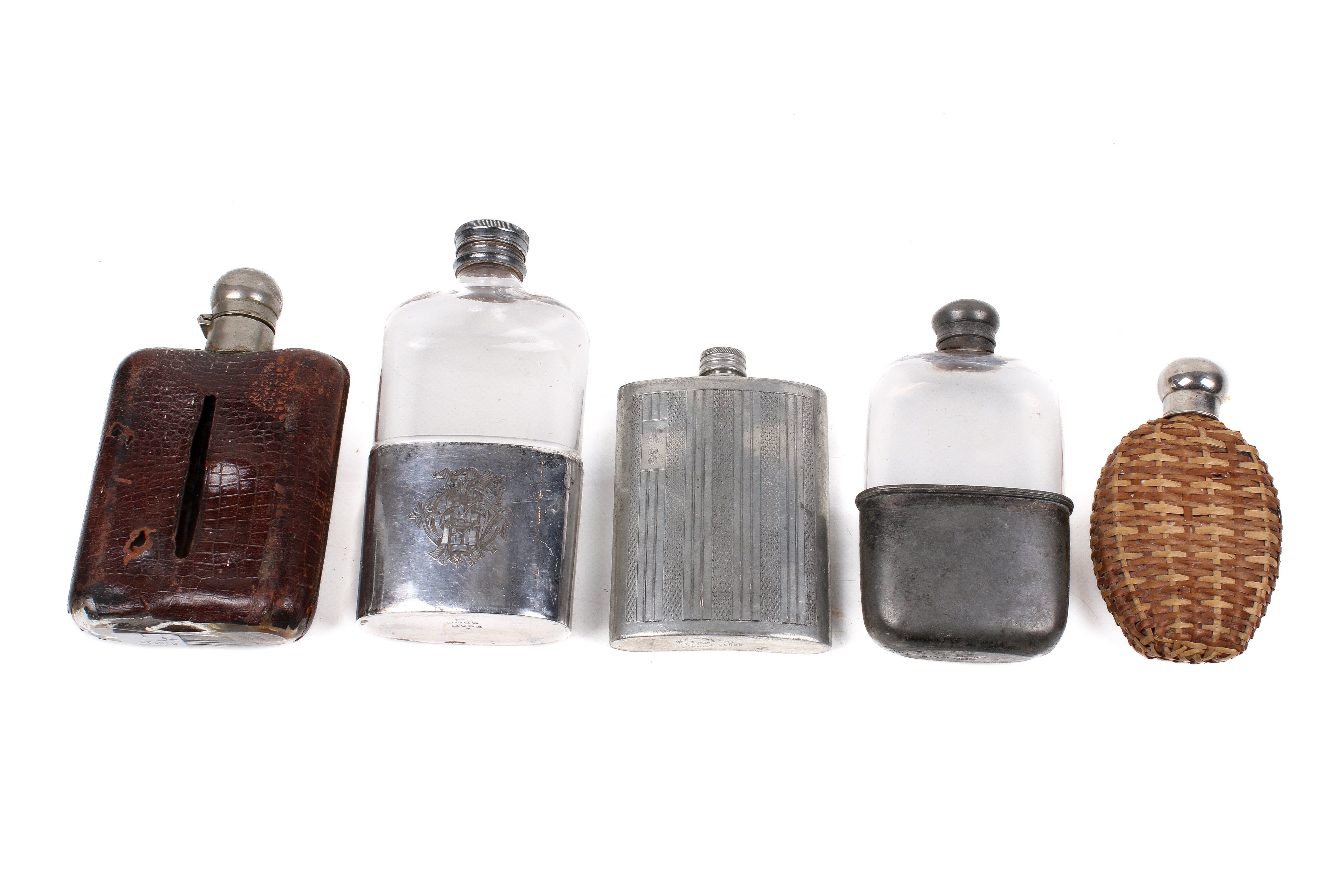 Silver | A collection of five assorted late 19th early 20th century hip ...