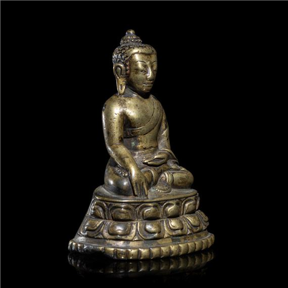 A Tibetan Copper Alloy Figure of Buddha Shakyamuni by Tibetan School, 14th Century, 14th/15th Century