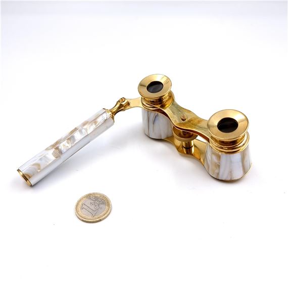 A good pair of Brass mounted opera glasses set with mother o - Vision