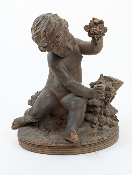 Artwork by Renè Rod, René ROD (XIX-XXe siècle) SCULPTURE en terre cuite dans le goût du XVIIIe représentant un enfant jouant avec une grappe de raisin. Signée Roll à l'arrière.  ;  (Manque), Made of Terracotta