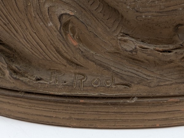 Artwork by Renè Rod, René ROD (XIX-XXe siècle) SCULPTURE en terre cuite dans le goût du XVIIIe représentant un enfant jouant avec une grappe de raisin. Signée Roll à l'arrière.  ;  (Manque), Made of Terracotta