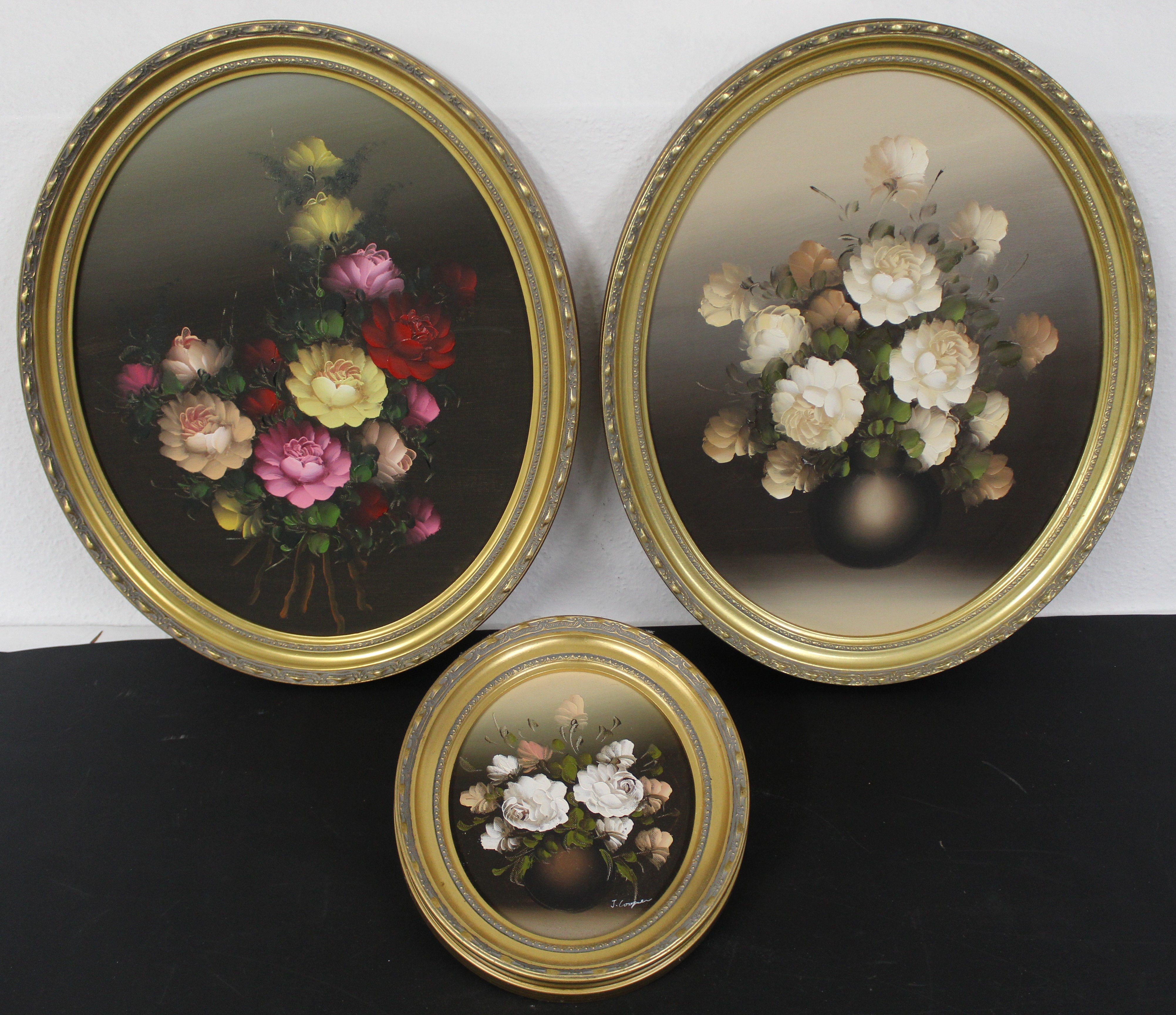 J. Cooper | Pair of still life oil paintings of flowers in a vase, in ...