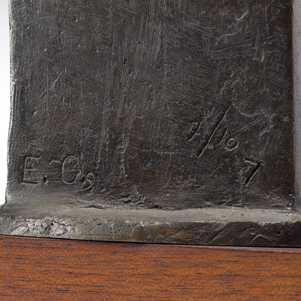 Artwork by Elizabeth Catlett, Mother and Child, Made of bronze with a brown patina, mounted