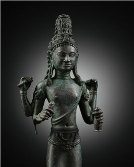 A BRONZE FIGURE OF AVALOKITESHVARA, SRIVIJAYA, 8TH-EARLY 9TH CENTURY - Thai School, 8th Century
