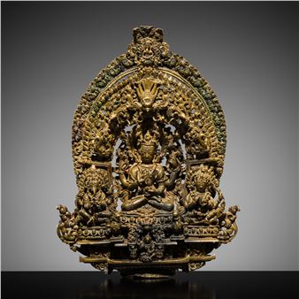 A RARE BRONZE TRIAD OF MANJUSHRI, MAHAKALA AND GANAPATI, 19TH CENTURY OR EARLIER - Nepalese School, 19th Century
