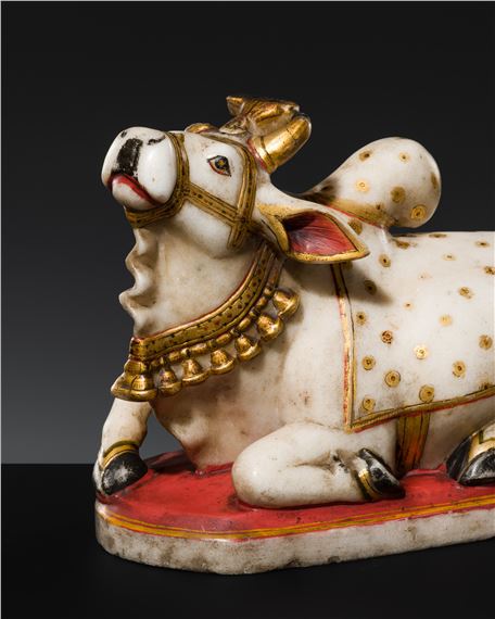 A GILT AND PAINTED WHITE MARBLE FIGURE OF NANDI, LATE 18TH