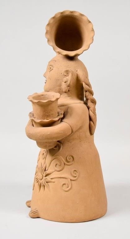 Artwork by Teodora Blanco Nunez, woman with baskets, Made of pottery