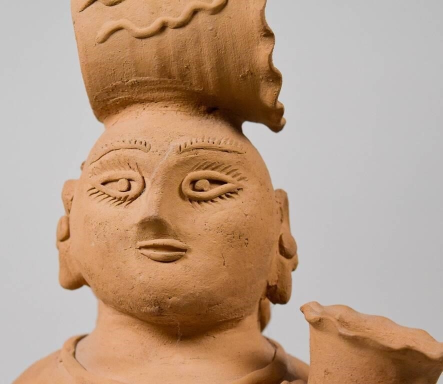 Artwork by Teodora Blanco Nunez, woman with baskets, Made of pottery