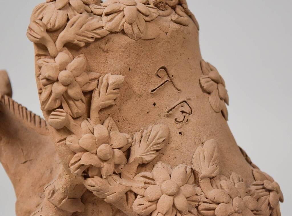 Artwork by Teodora Blanco Nunez, 1928-1980). Pair of Mexican folk art pottery figures. Figure riding elephant, Made of pottery