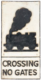 Heavily cast sign in black and white - Gates