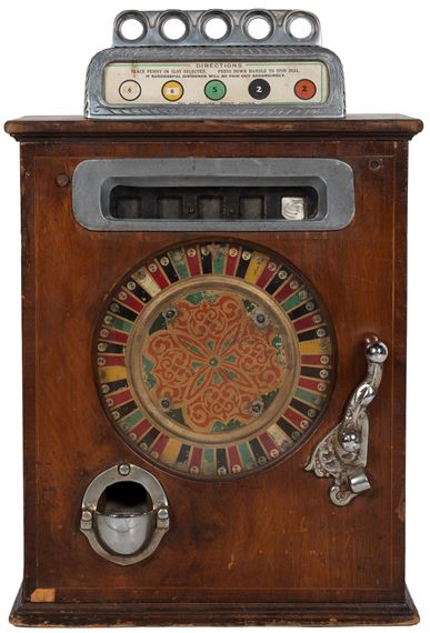 Wooden cabinet with nickeled handle and casting on the front and top