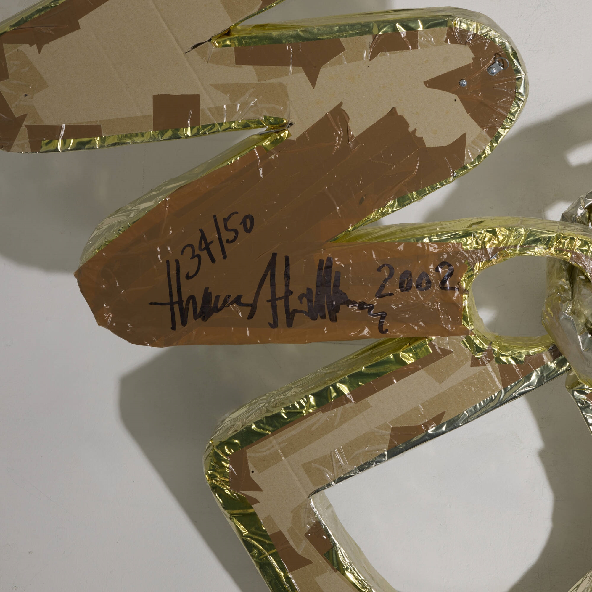 Artwork by Thomas Hirschhorn, CNN, Made of plastic, golden wrapping paper