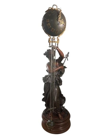 Swinger Clock by Vincent-Désire Faure de Broussé