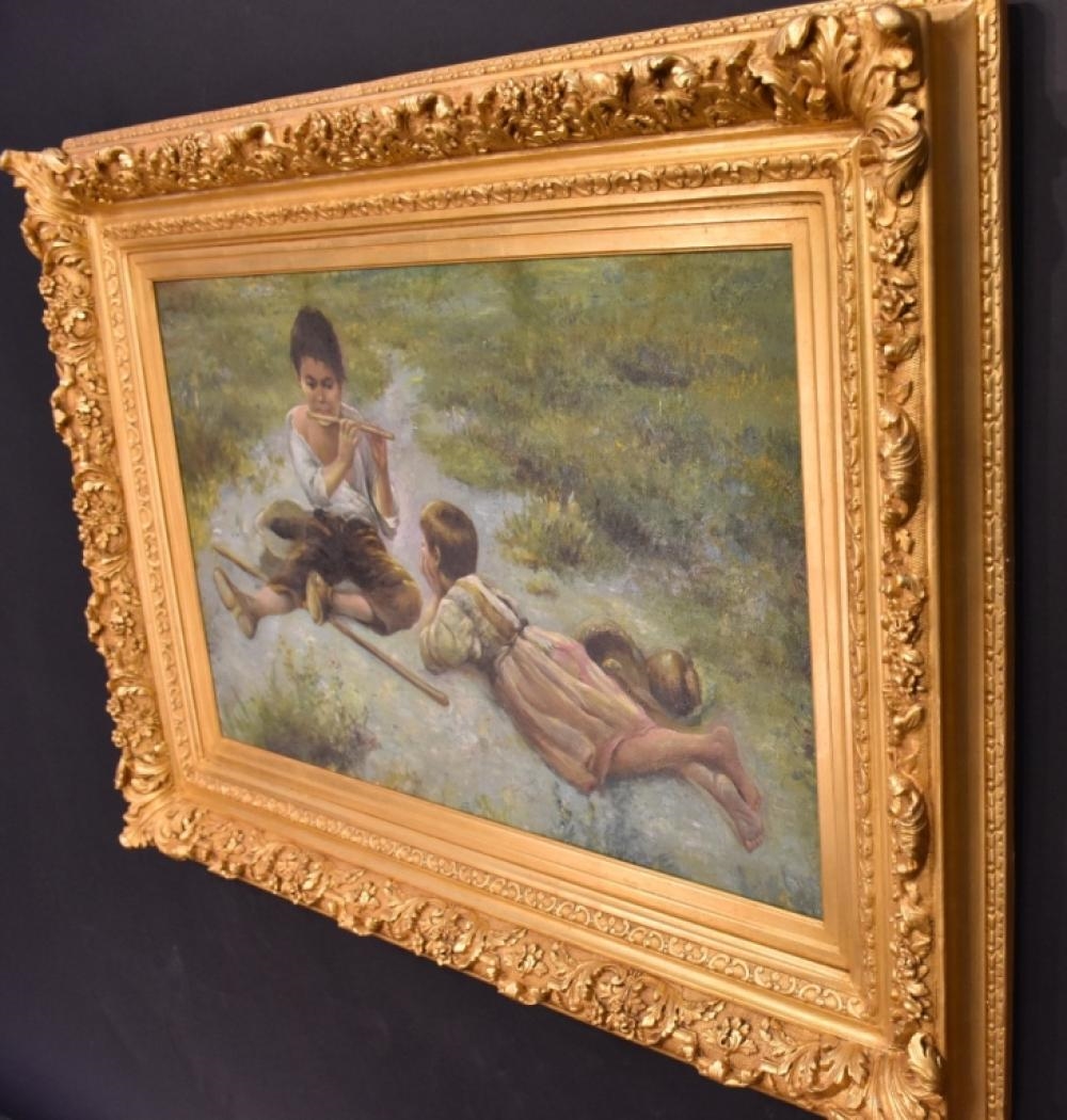 Artwork by R. Devane, R. Devane. The pipe player entertaining his friend. Signed lower left. In elaborate gilt frame. H 53cm, Made of gilt