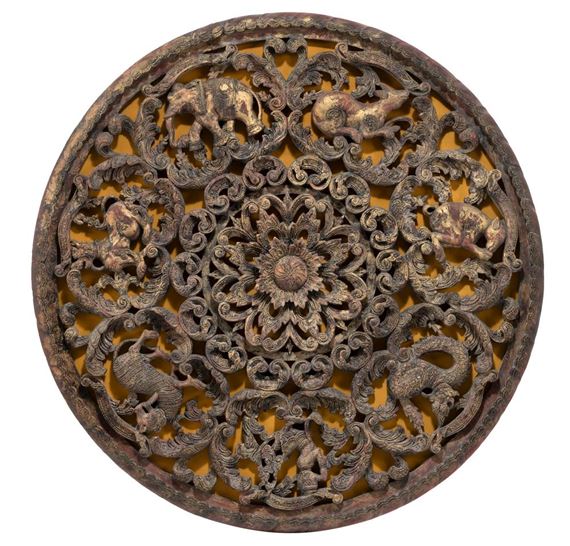 Thai School, 19th Century | A CIRCULAR OPENWORK WOOD PANEL (20) | MutualArt