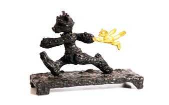 A dynamic bronze sculpture of a figure chasing a golden winged object.