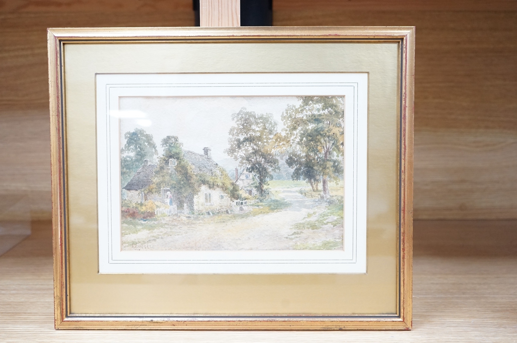 A soft watercolor landscape of a rural cottage scene with a figure at the doorway.