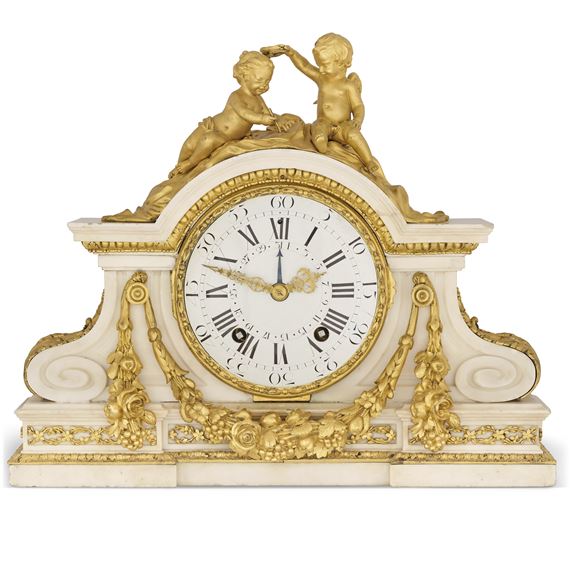 A LOUIS XVI ORMOLU-MOUNTED WHITE MARBLE MANTEL CLOCK