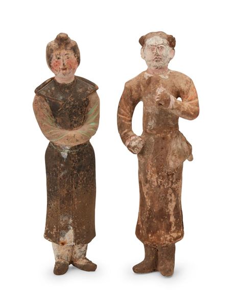Two Chinese pottery attendant figures
