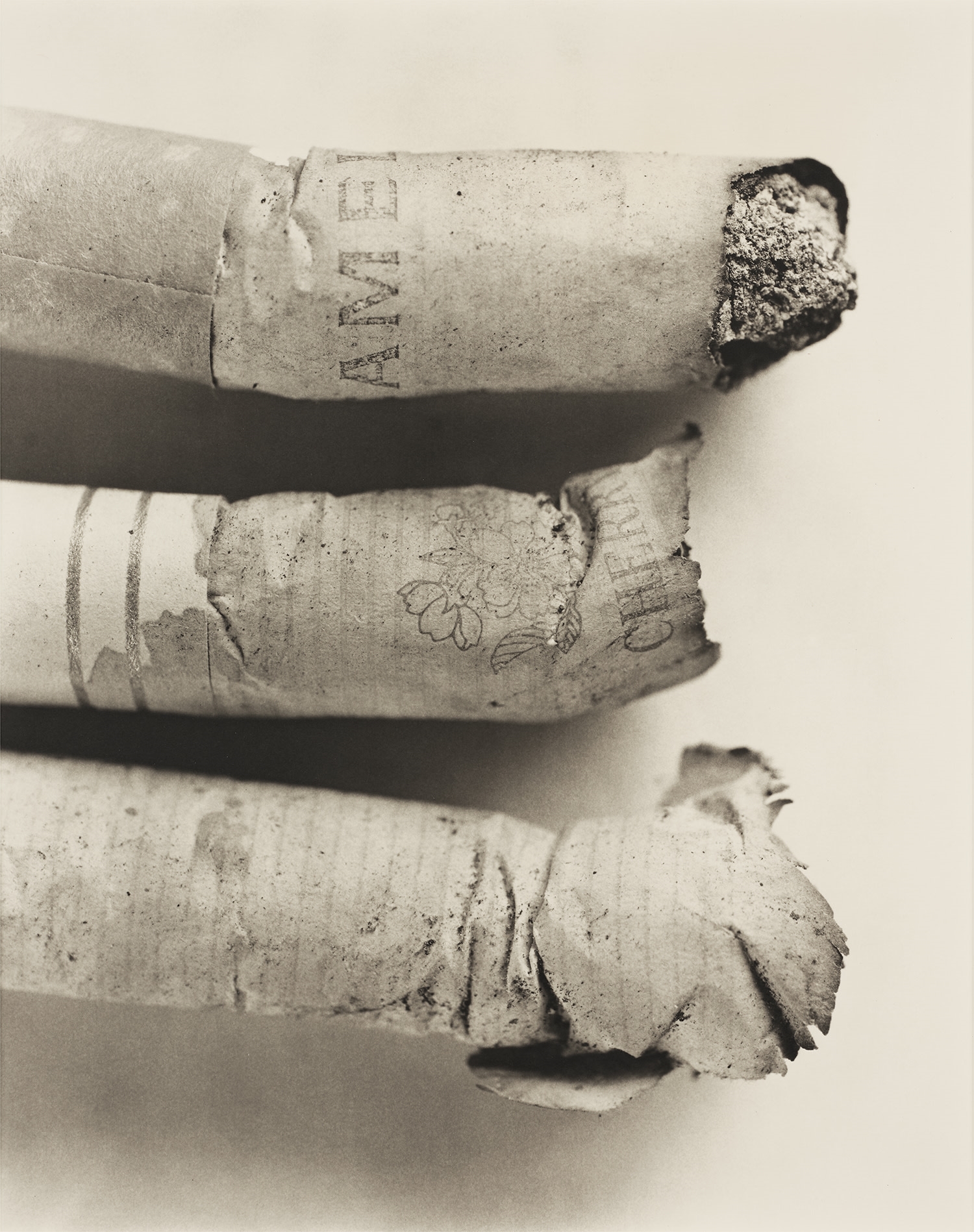 Artwork by Irving Penn, Cigarette #135 (C415), Made of platinum palladium print