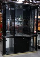 A sleek, black glass display cabinet with a minimalist design.