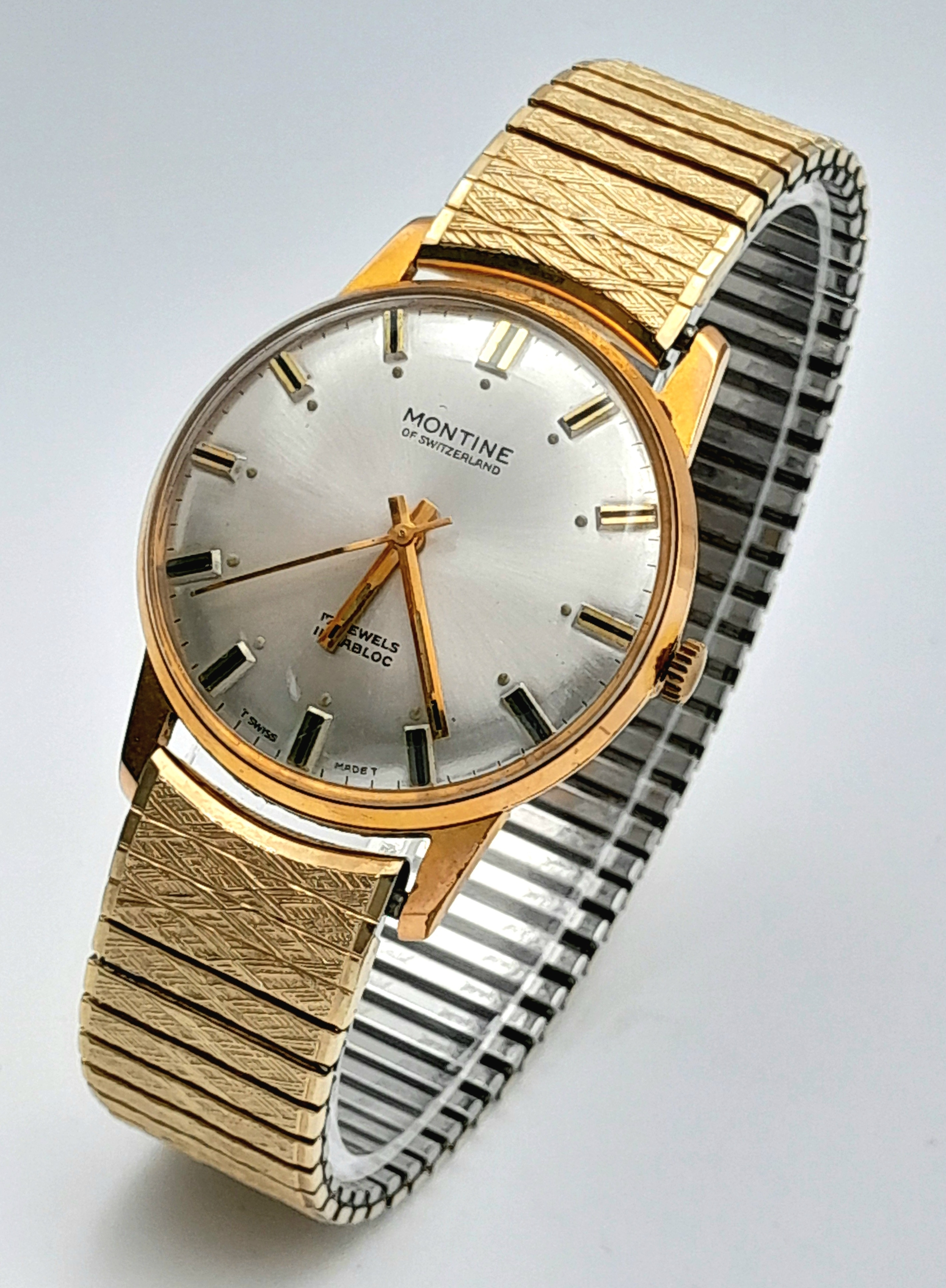 Artwork by MANUAL, A Men's Montine of Switzerland 17 Jewel Incabloc, Made of Gold