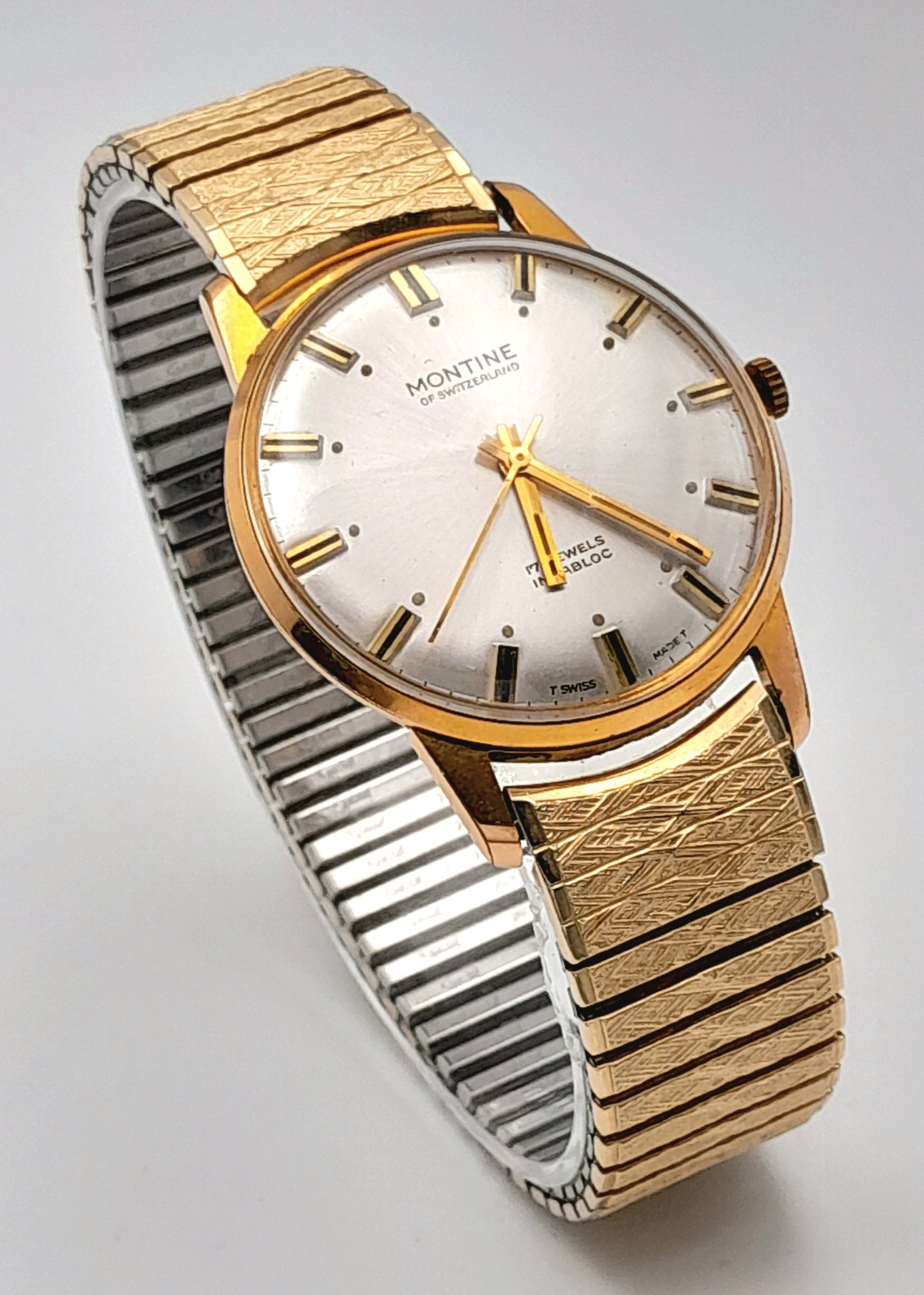 Artwork by MANUAL, A Men's Montine of Switzerland 17 Jewel Incabloc, Made of Gold