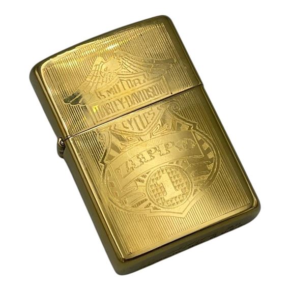 Harley Davidson | A vintage US Zippo Harley Davidson Gold-Toned