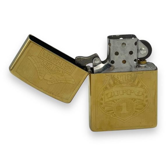 Harley Davidson | A vintage US Zippo Harley Davidson Gold-Toned