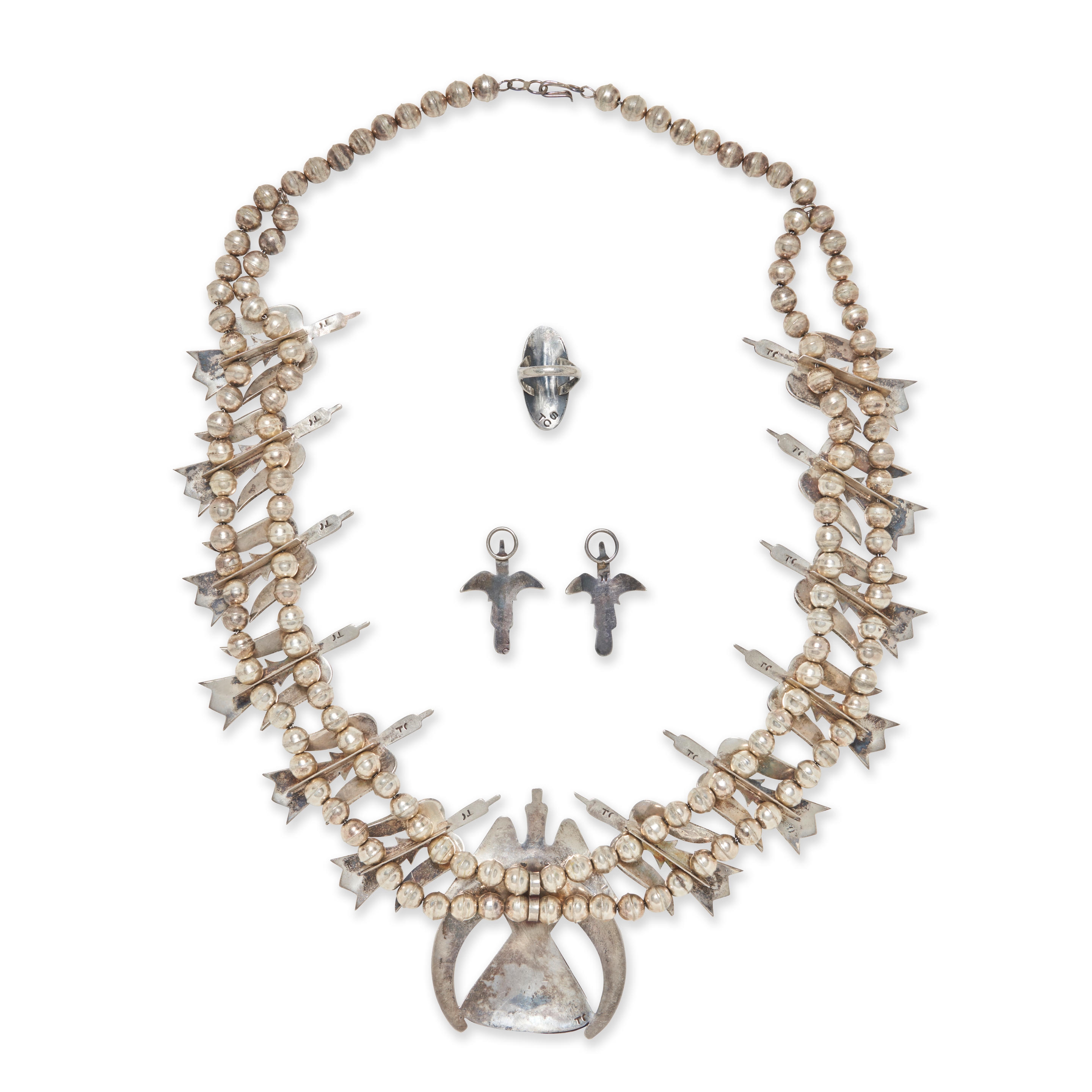 Artwork by Tommy Singer, A suite of Tommy Singer jewelry, Made of silver and turquoise