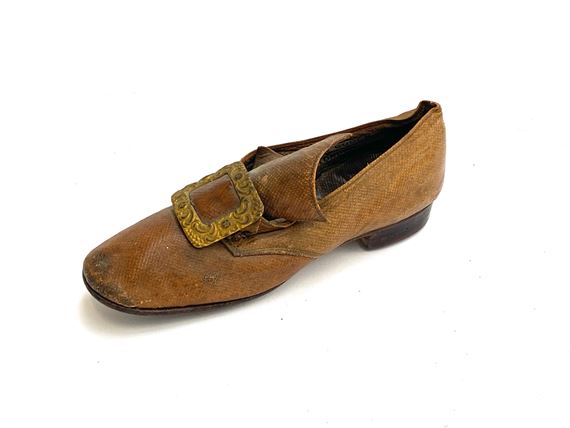 A lateth century  child's shoe c with  repousse buckle, bears label for John Gooch Brompton Rd - Gooch