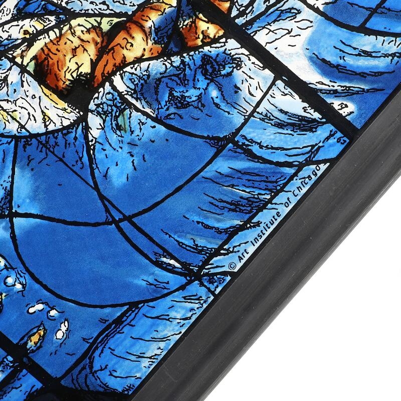 A pair of stained glass panels depicting a surreal, blue-toned scene with abstract figures and symbolic objects.