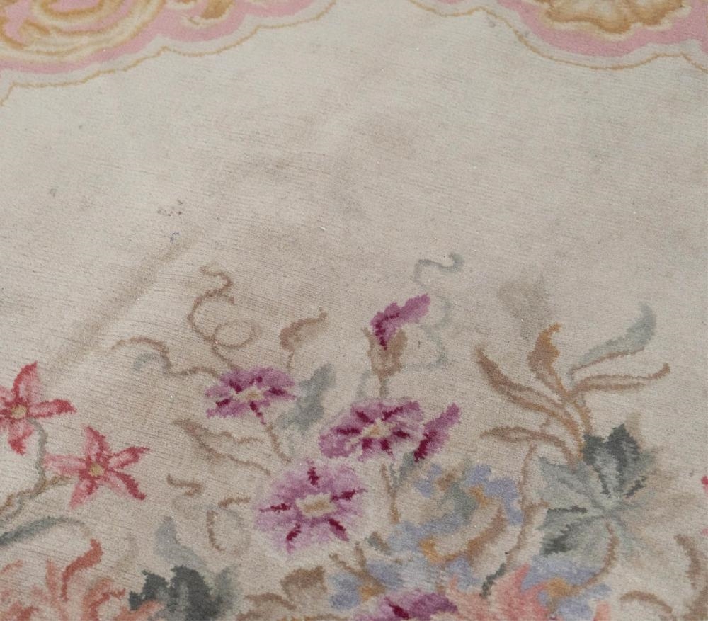Jewelry | A Continental Oval Floral Rug | MutualArt