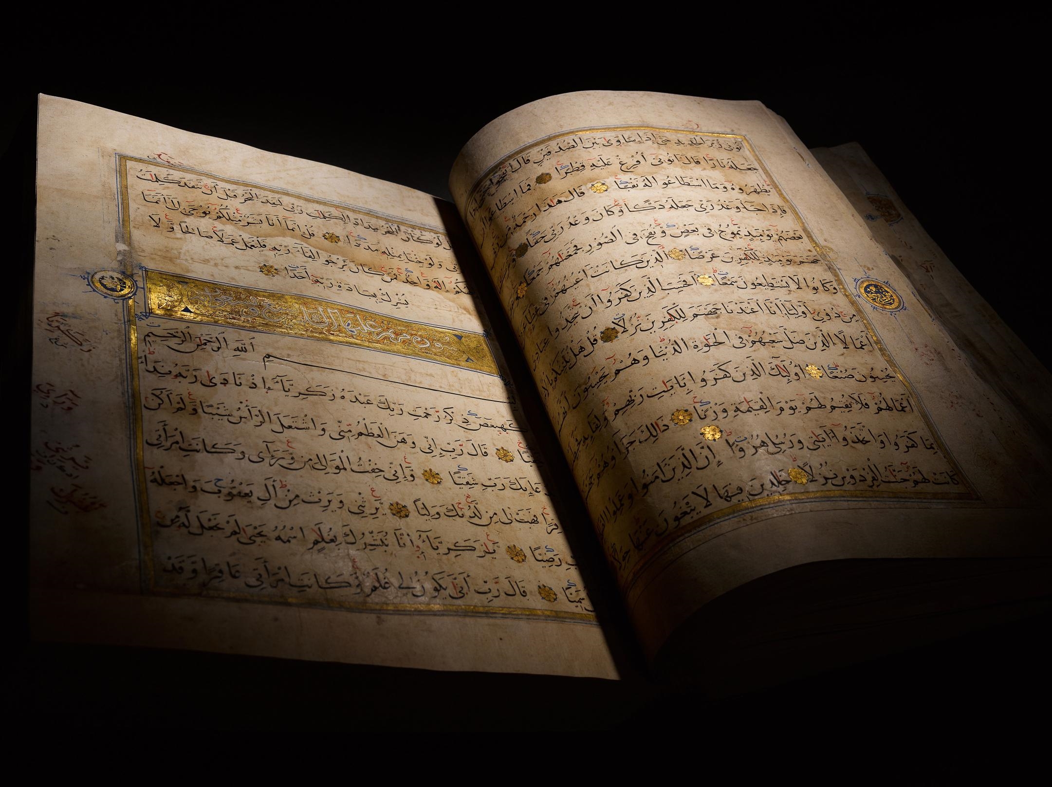 Artwork by Muhammad Abu Al-fadl Ibn ‘abd Al-wahhab Al-a’raj, A large illuminated Mamluk Qur’an, Made of Arabic manuscript on paper, 293 leaves, plus 3 flyleaves, 13 lines to the page written in naskh in black ink, verses separated by gold rosettes with red and blue dots, surah headings in large white thuluth within illuminated panels, further text divisions marked by illuminated marginal medallions, f.1a with 16th century Ottoman illuminated frontispiece, f.1b and f.2a with double page illuminated frontispiece framing text written in blue and gold