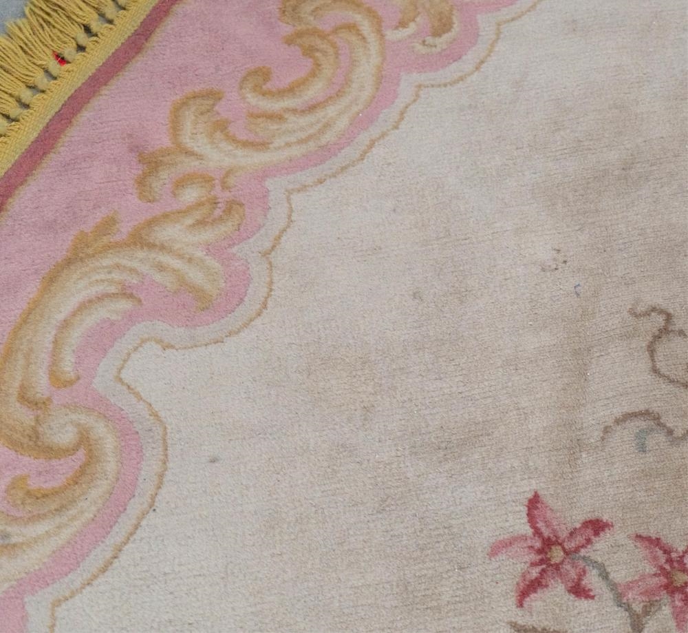 Jewelry | A Continental Oval Floral Rug | MutualArt
