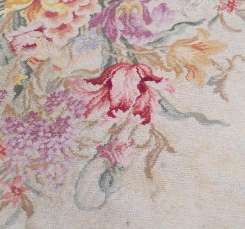 Jewelry | A Continental Oval Floral Rug | MutualArt